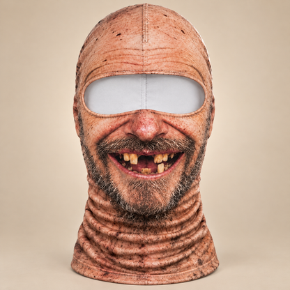 The Toothless Grin balaclava: bald printed head, stubble beard and a gap-tooth grin, with the stretch neck tube