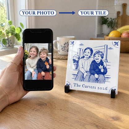 A phone showing a photo of two children on porch steps next to the same photo redrawn on a Delft-blue tile
