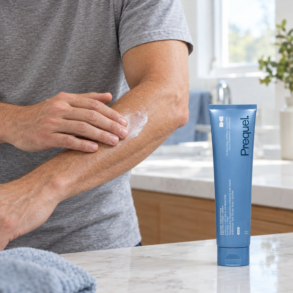 Smoothing the Rich cream onto the forearm and elbow