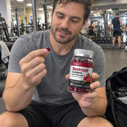 Taking a beetroot gummy at the gym before a workout