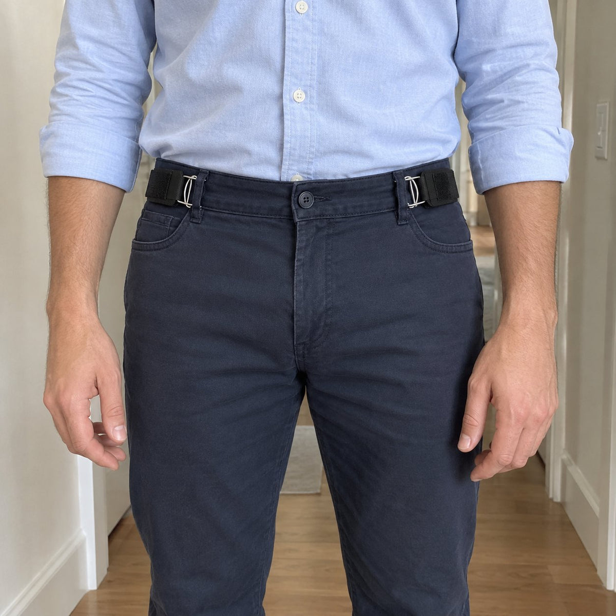 Tucked shirt with a flat front, straps at the hips