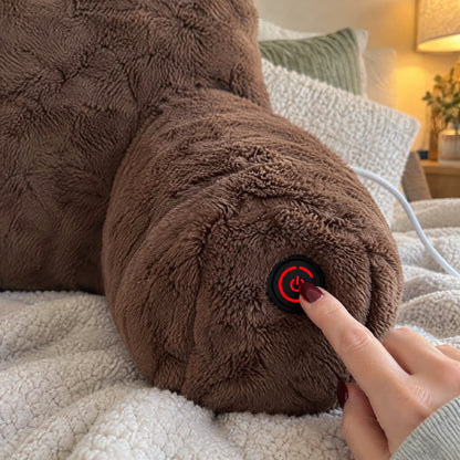 Finger pressing the armrest power button, its ring glowing red
