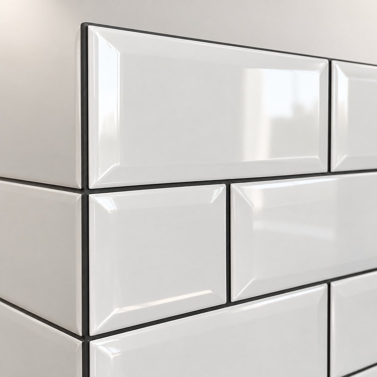 Close-up of the glossy bevel and the grout line