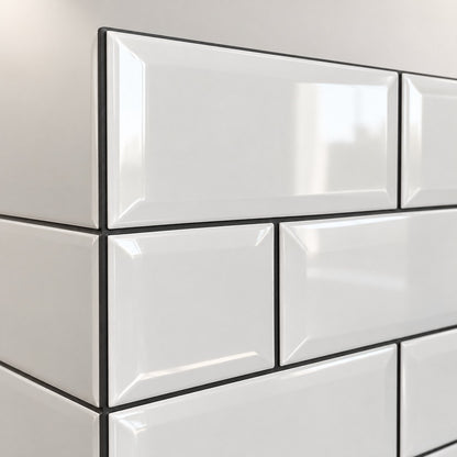 Close-up of the glossy bevel and the grout line