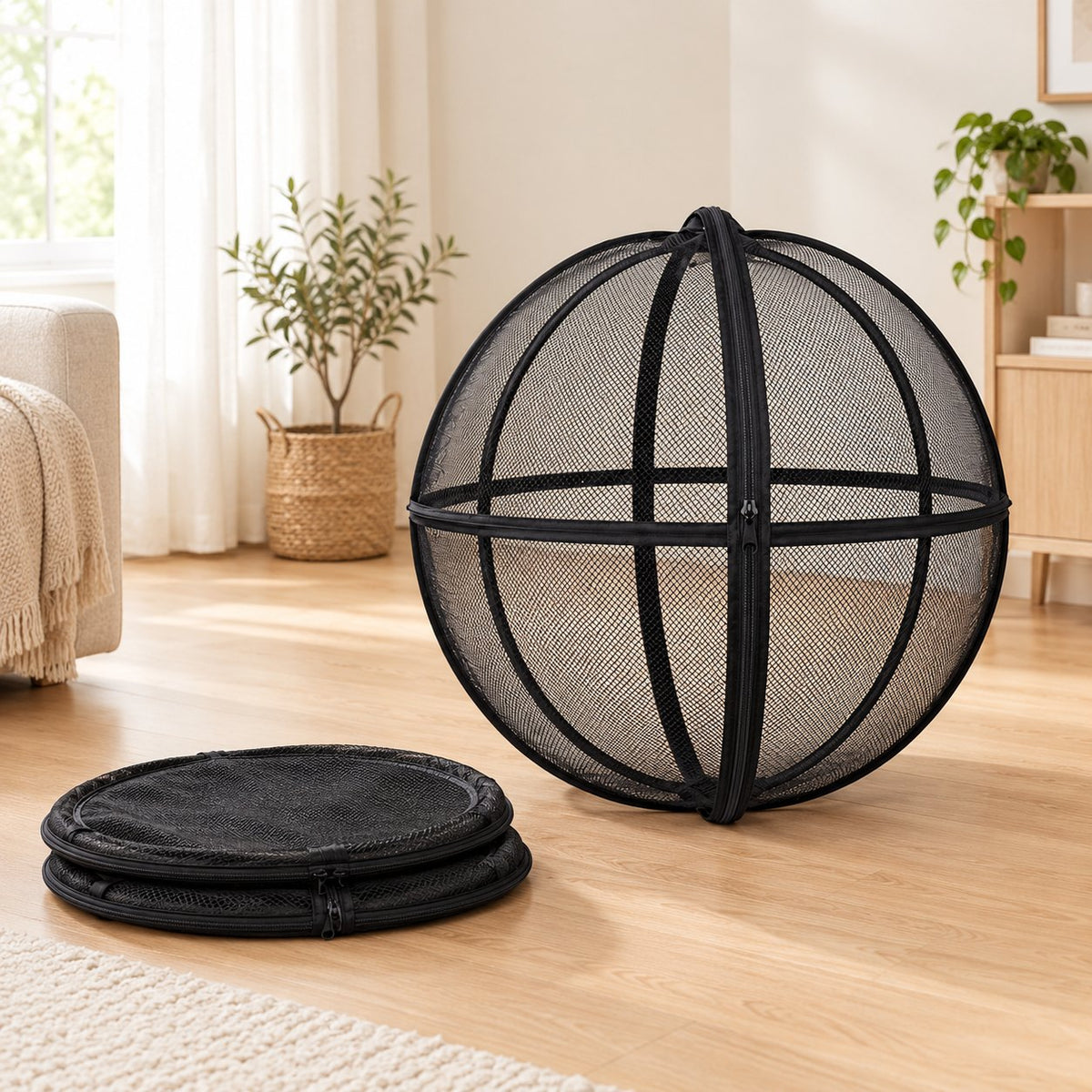 Two folded playpens next to one open playpen ball