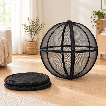 Two folded playpens next to one open playpen ball