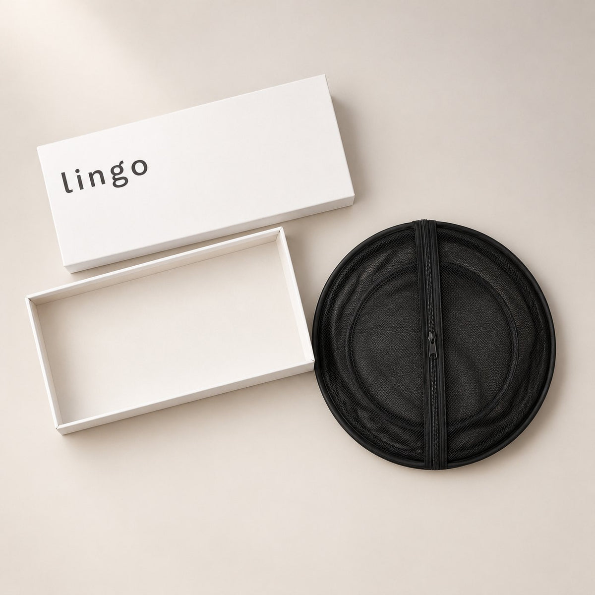 What's in the box: the playpen folded flat and its lingo box