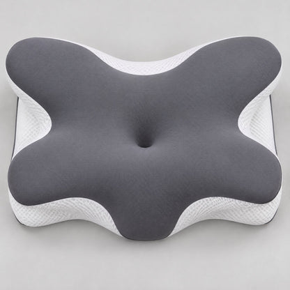 Top view of the butterfly-shaped contour pillow: center hollow, side wings, neck edge