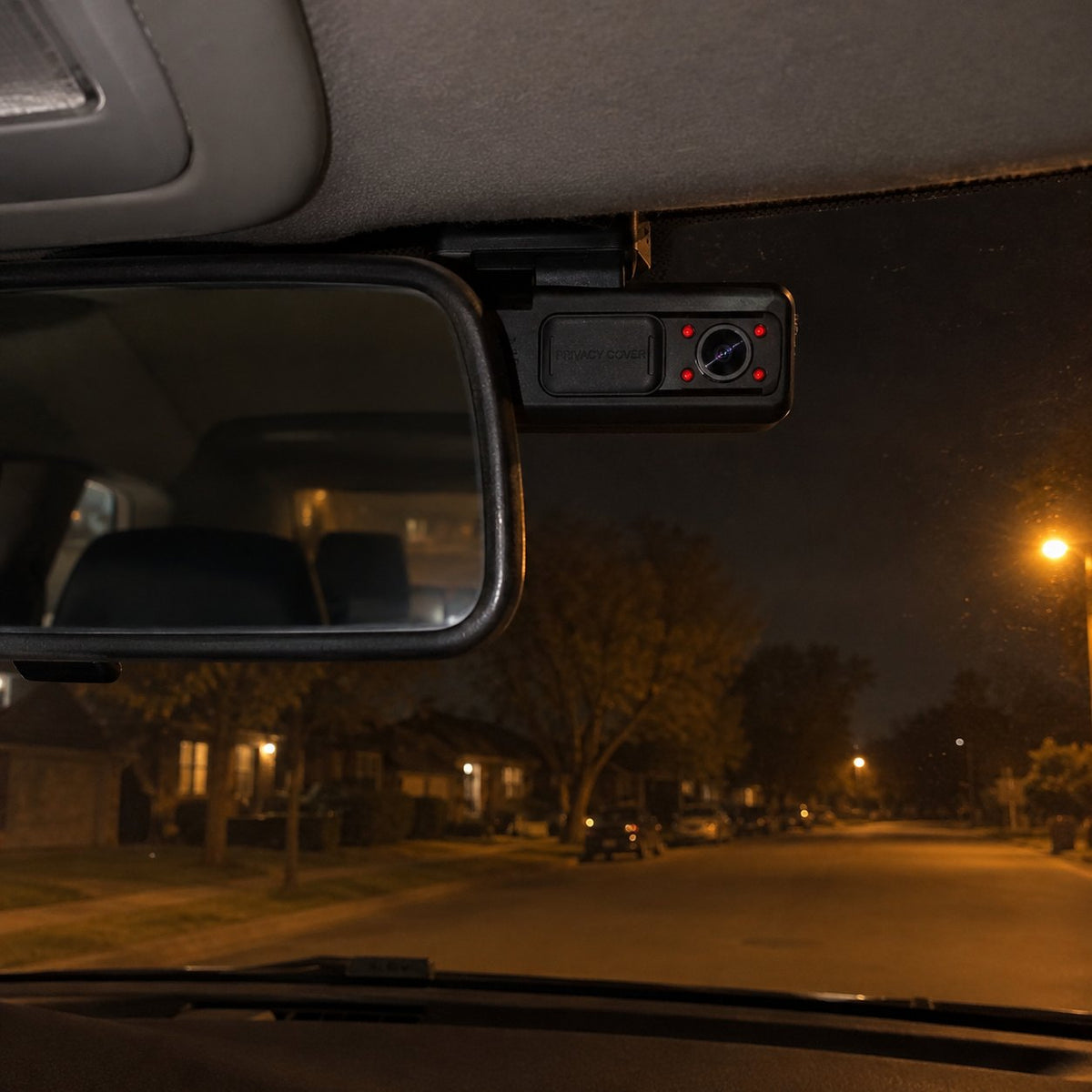 Cabin lens night vision LEDs glowing in a parked car at night