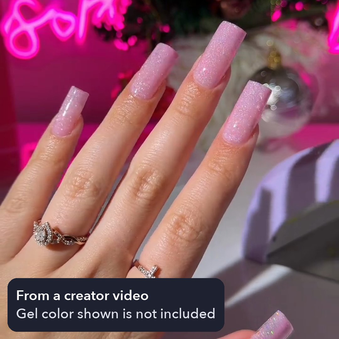 Creator's finished set of square tips, worn with a pink glitter gel color that is not included in the kit