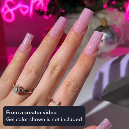 Creator's finished set of square tips, worn with a pink glitter gel color that is not included in the kit