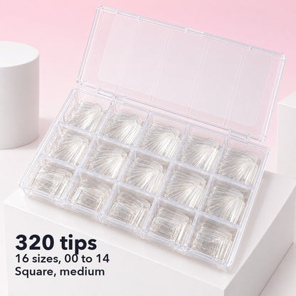 Open case of 320 clear square soft gel tips on a white plinth