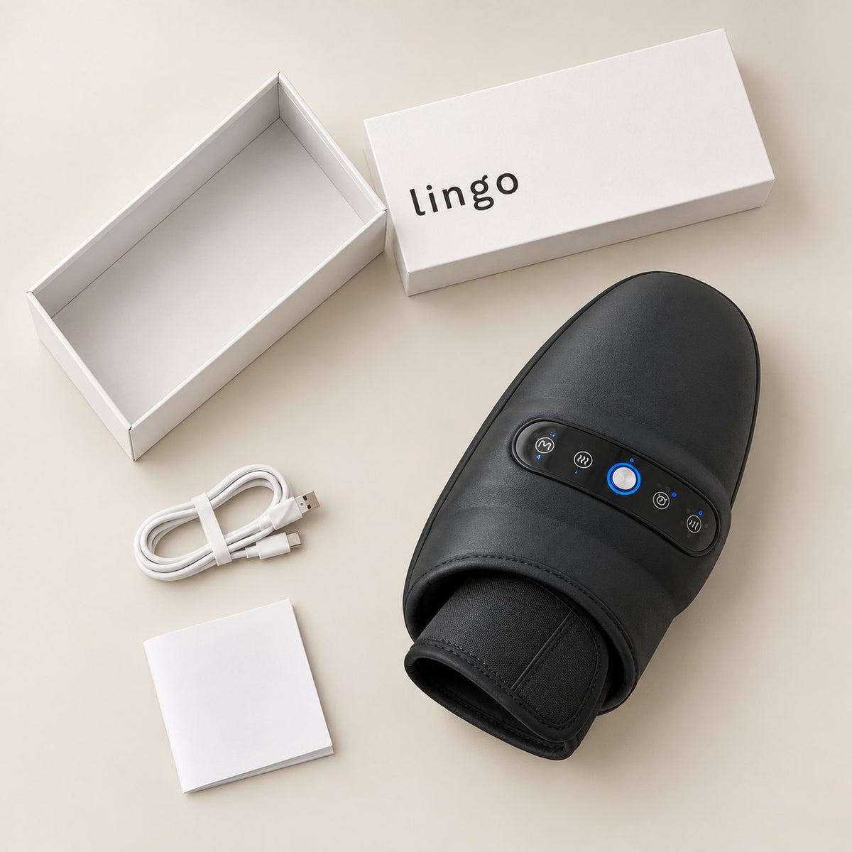 What's in the box: the hand massager, its USB charging cable and the lingo box