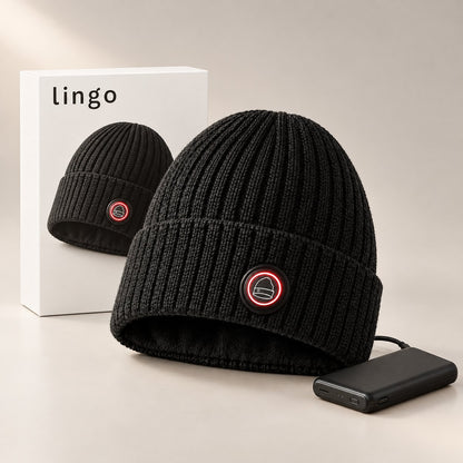 Heated beanie with its button glowing red, its battery and the lingo box