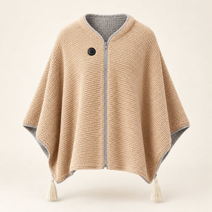 The heated shawl worn zipped up like a poncho