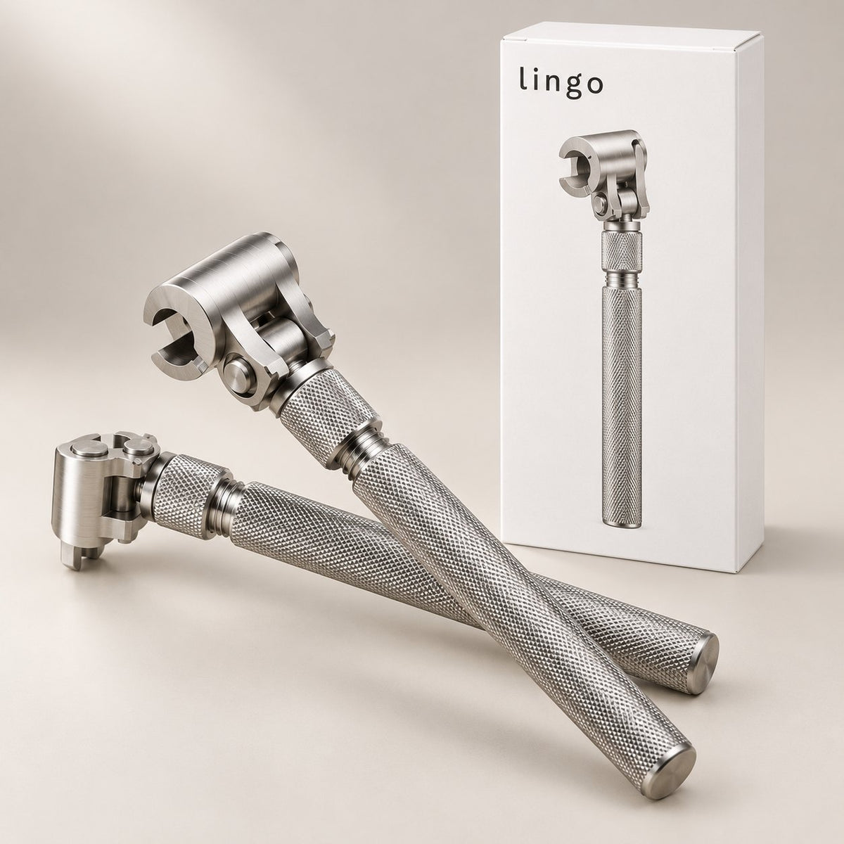 Two hinge wrenches crossed in front of the lingo box