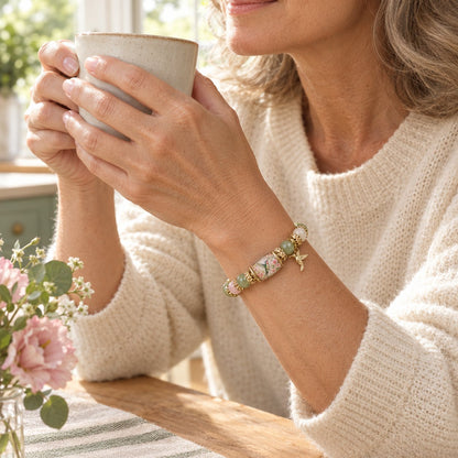 Wearing the hummingbird bracelet with a morning coffee