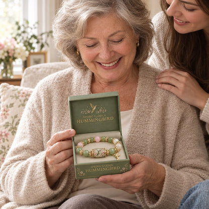 Opening the hummingbird bracelet gift box