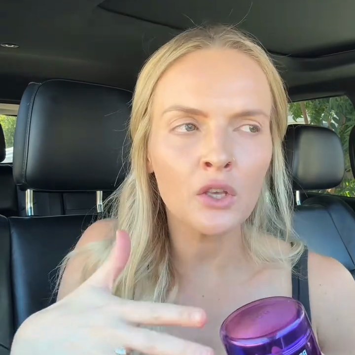 Creator holding the jar in her car, frame from her video