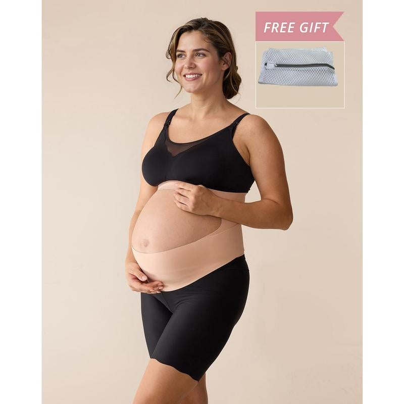 Pregnant woman wearing the nude maternity support band, with a band under the bump and a band above it, and the free zip mesh laundry bag