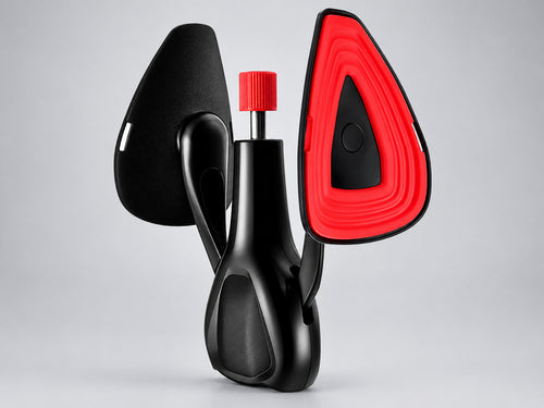 Men's pelvic floor trainer: glossy black body with a red knob on a silver rod, two curved arms and two shield-shaped pads, one showing its red ridged face