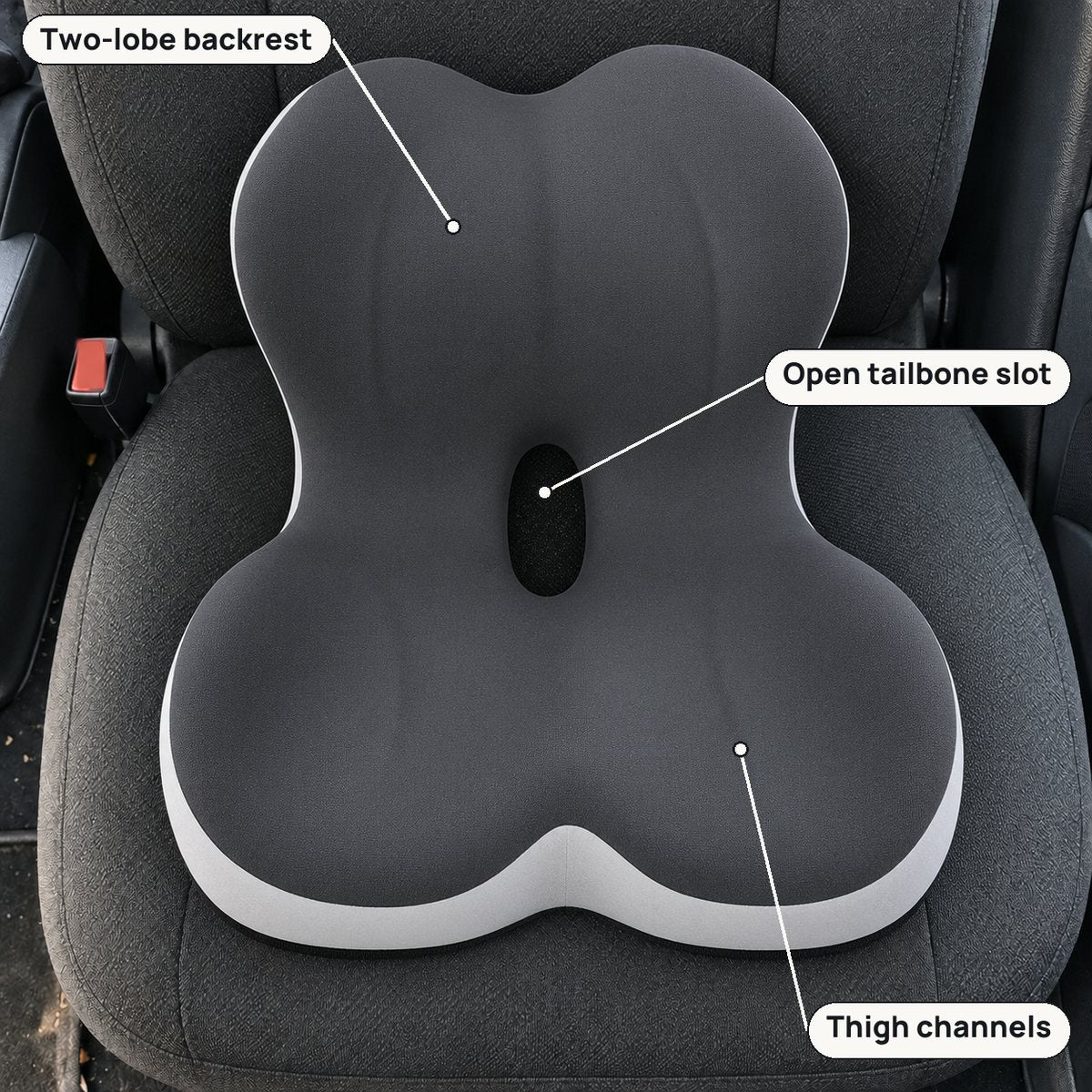 Front view of the cushion showing the two-lobe backrest, the open tailbone slot and two thigh channels