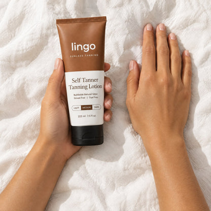 Even color on the hands and wrists, holding Lingo Self Tanner