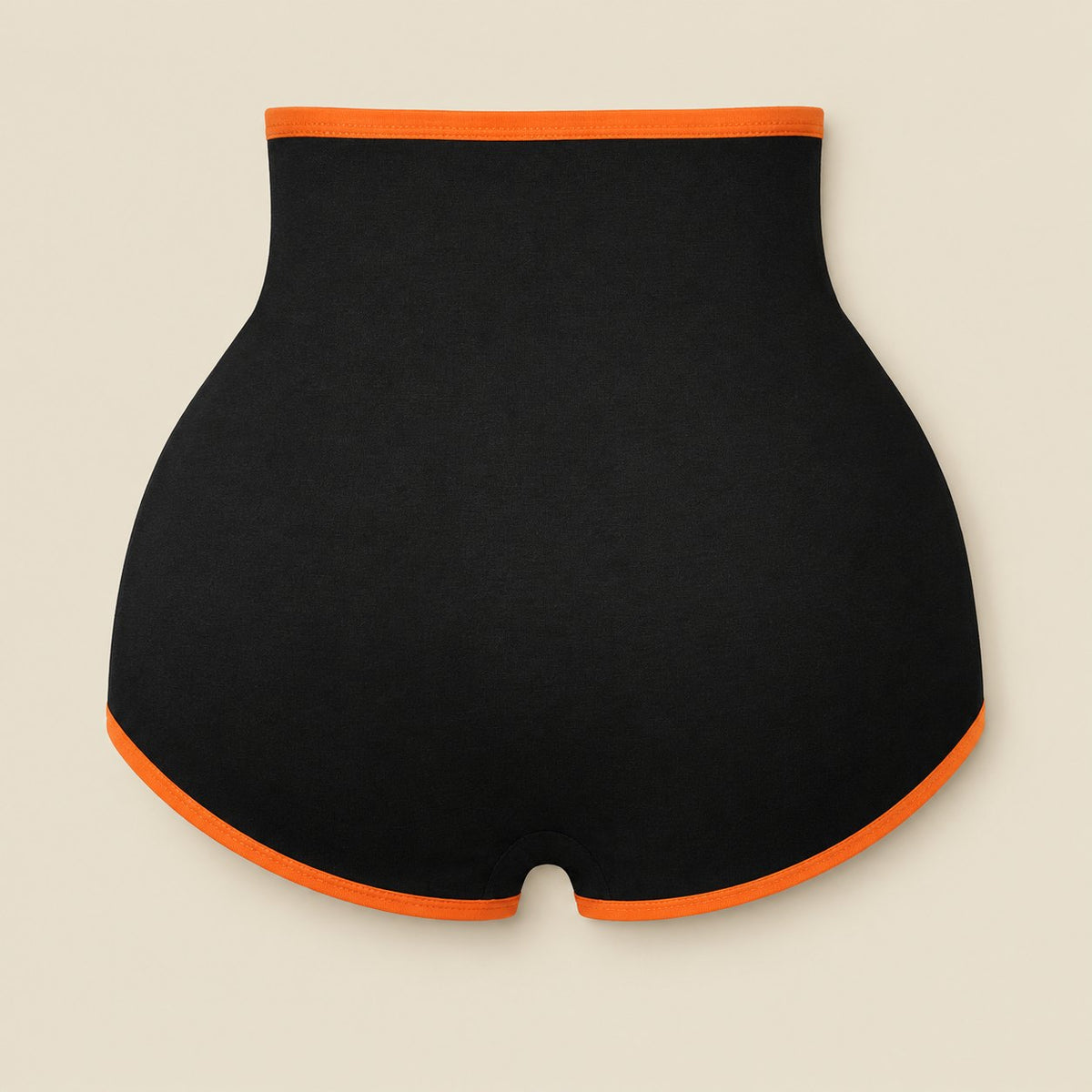 Back of the shaping brief: smooth full-coverage black panel with orange trim