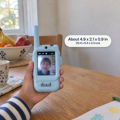 Blue video walkie-talkie in a child's hand, about 4.9 by 2.1 inches