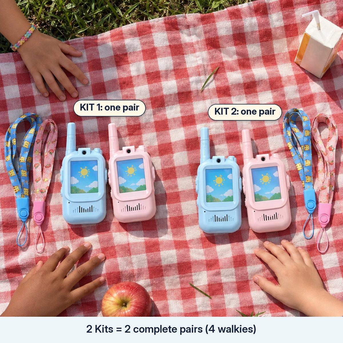 Two kits laid out as two separate pairs of blue and pink walkies on a picnic blanket