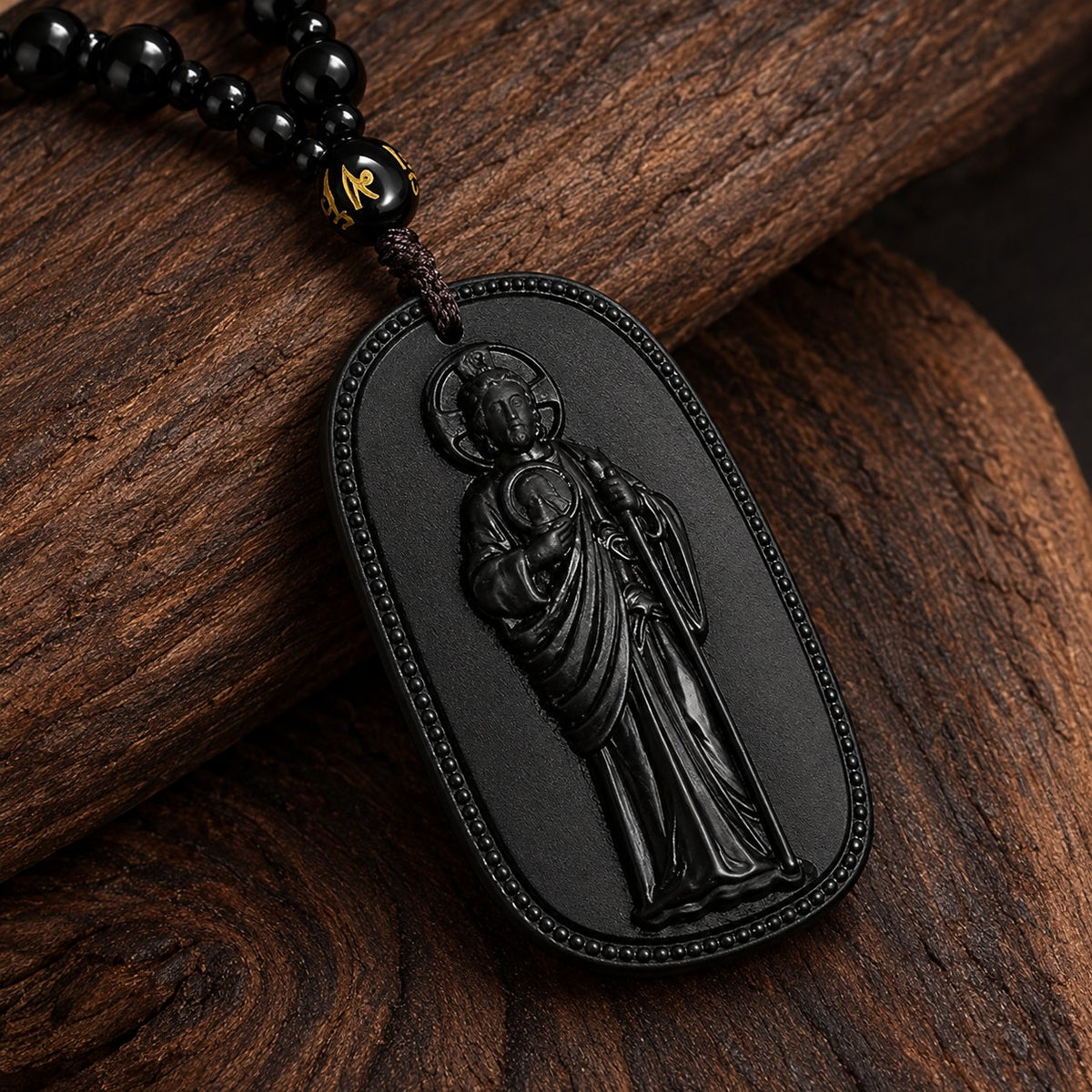 Close-up of the carved Saint Jude Thaddeus stone pendant