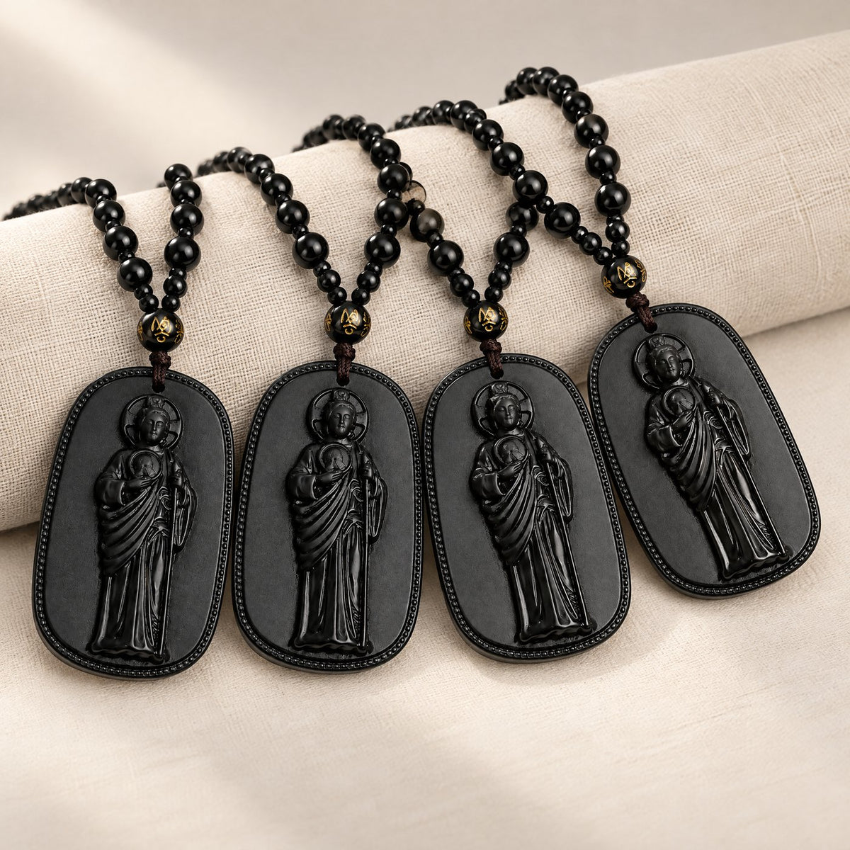 Four San Judas Tadeo necklaces