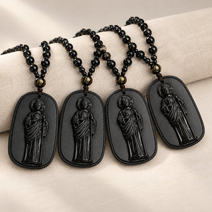 Four San Judas Tadeo necklaces