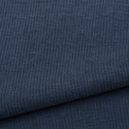 Close-up of the thick ribbed cotton knit in steel blue
