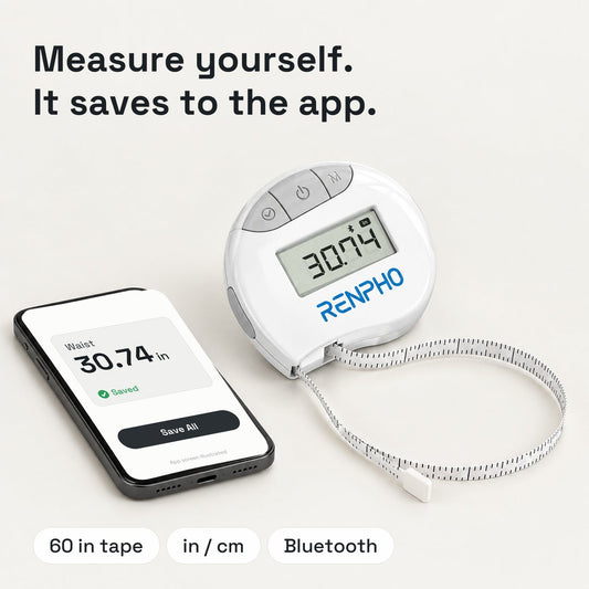 White smart tape measure with its tape looped beside a phone showing a saved waist measurement