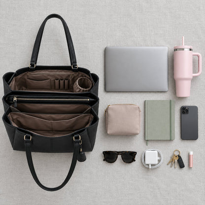 Black organizer tote open and empty next to everything that fits: laptop, 40 oz tumbler, pouch, planner, phone, keys