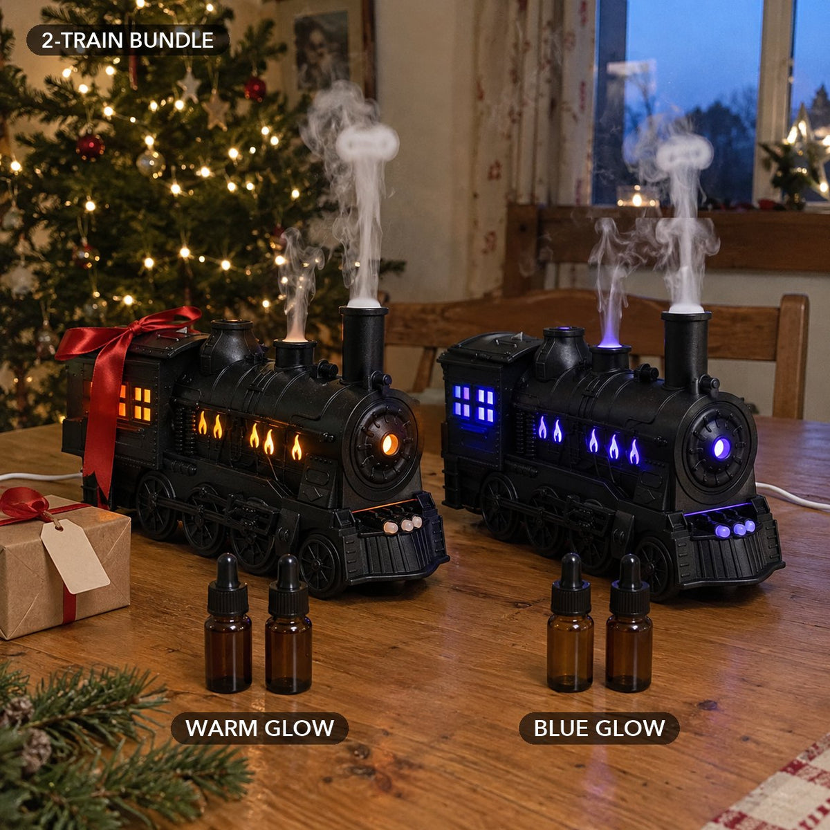 Two steam train diffusers puffing side by side, one glowing warm amber with a gift bow, one glowing cool blue