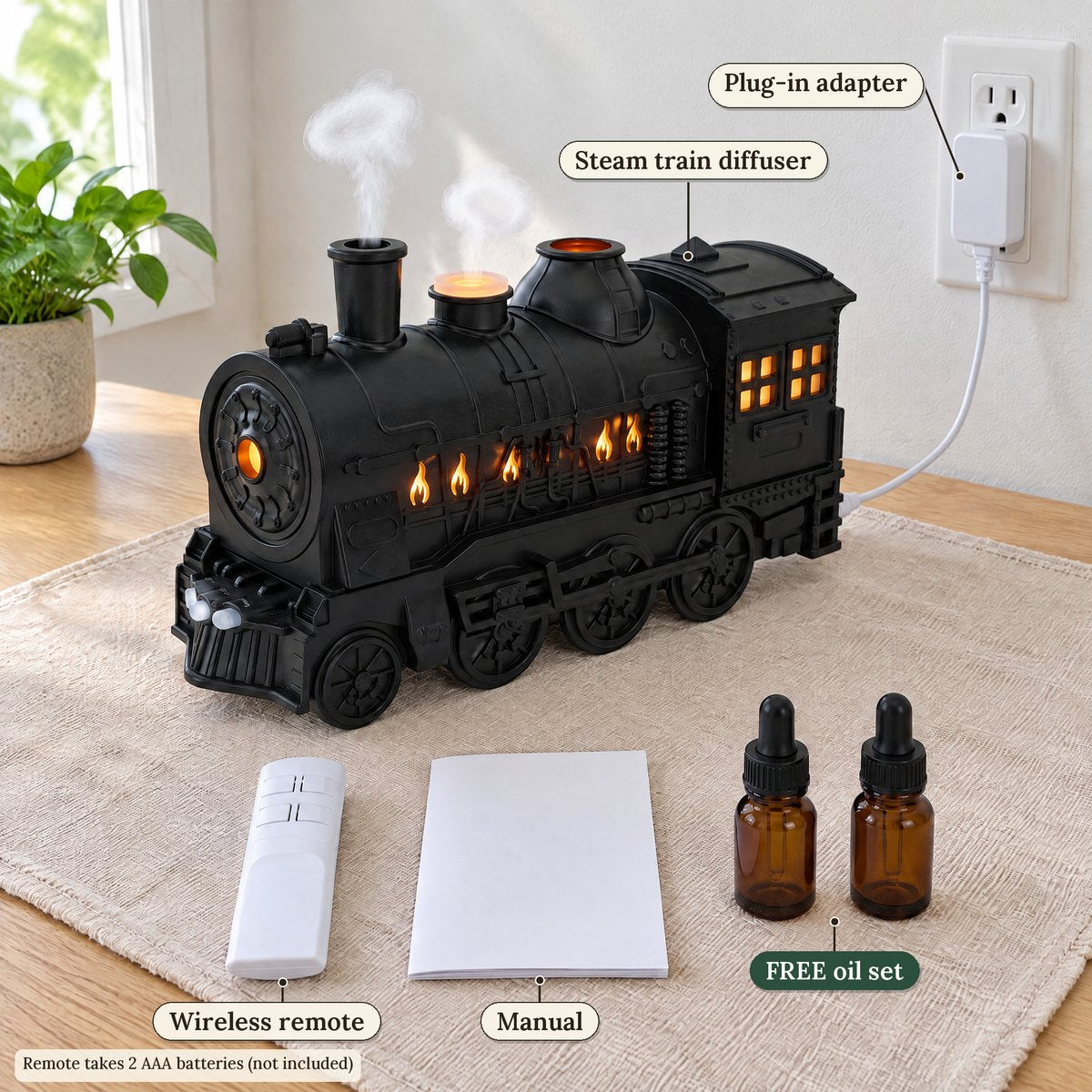 What's in the box: steam train diffuser, white remote, plug-in adapter, manual and the free essential oil set