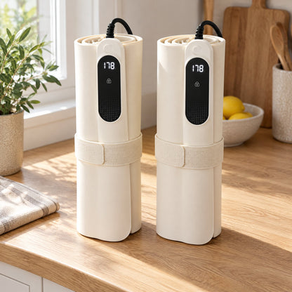 Two cream warming mats rolled up side by side