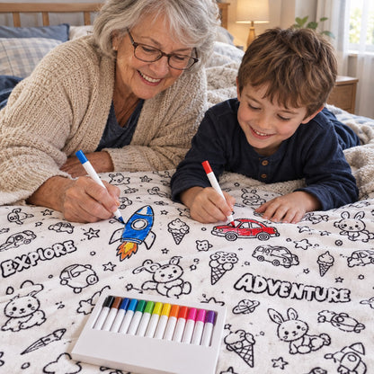 A grandmother and grandson coloring together