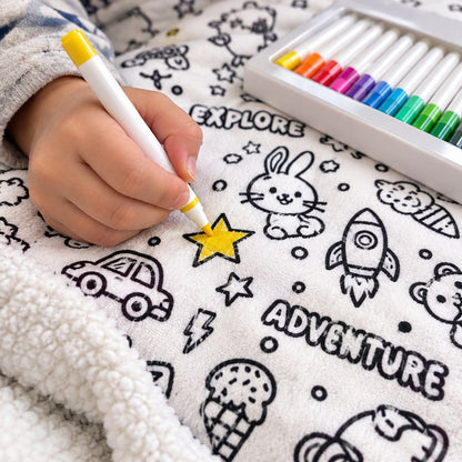 Close-up of a fabric marker coloring a star