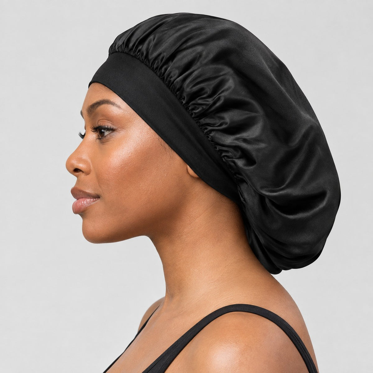 Woman wearing the Black bonnet, side view