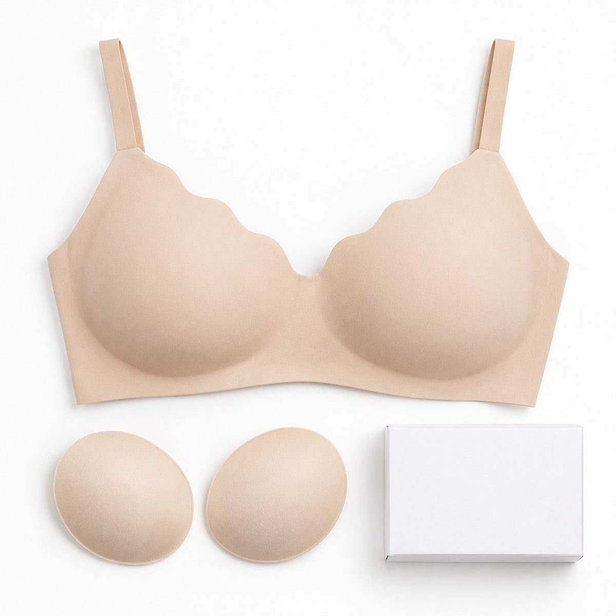 The bra laid flat with its two removable pads