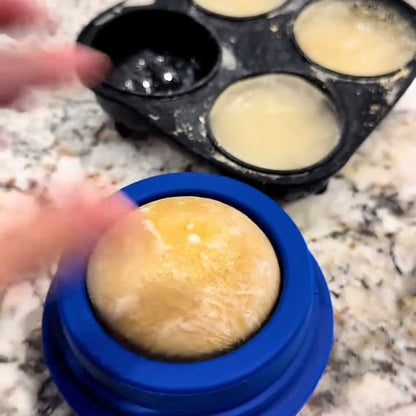 Peanut butter treats frozen in the silicone tray