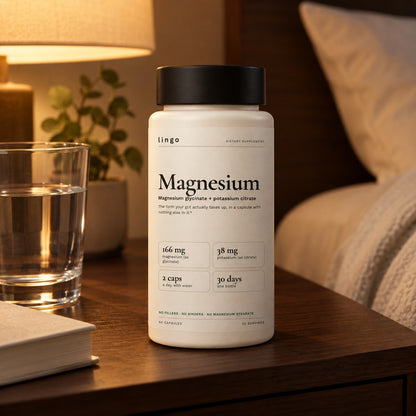 Lingo Magnesium on a bedside table with a glass of water