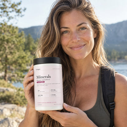 Woman holding a tub of Lingo Minerals