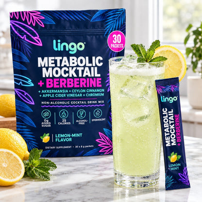 A tall glass of the fizzy lemon-mint mocktail with ice