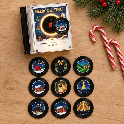 The nine mini records laid out with the player