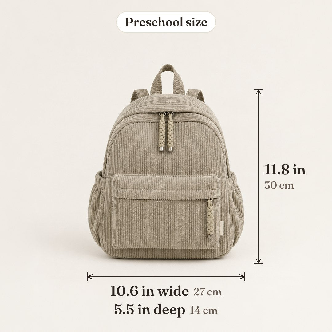 A khaki corduroy backpack with its size marked: 11.8 in tall, 10.6 in wide, 5.5 in deep