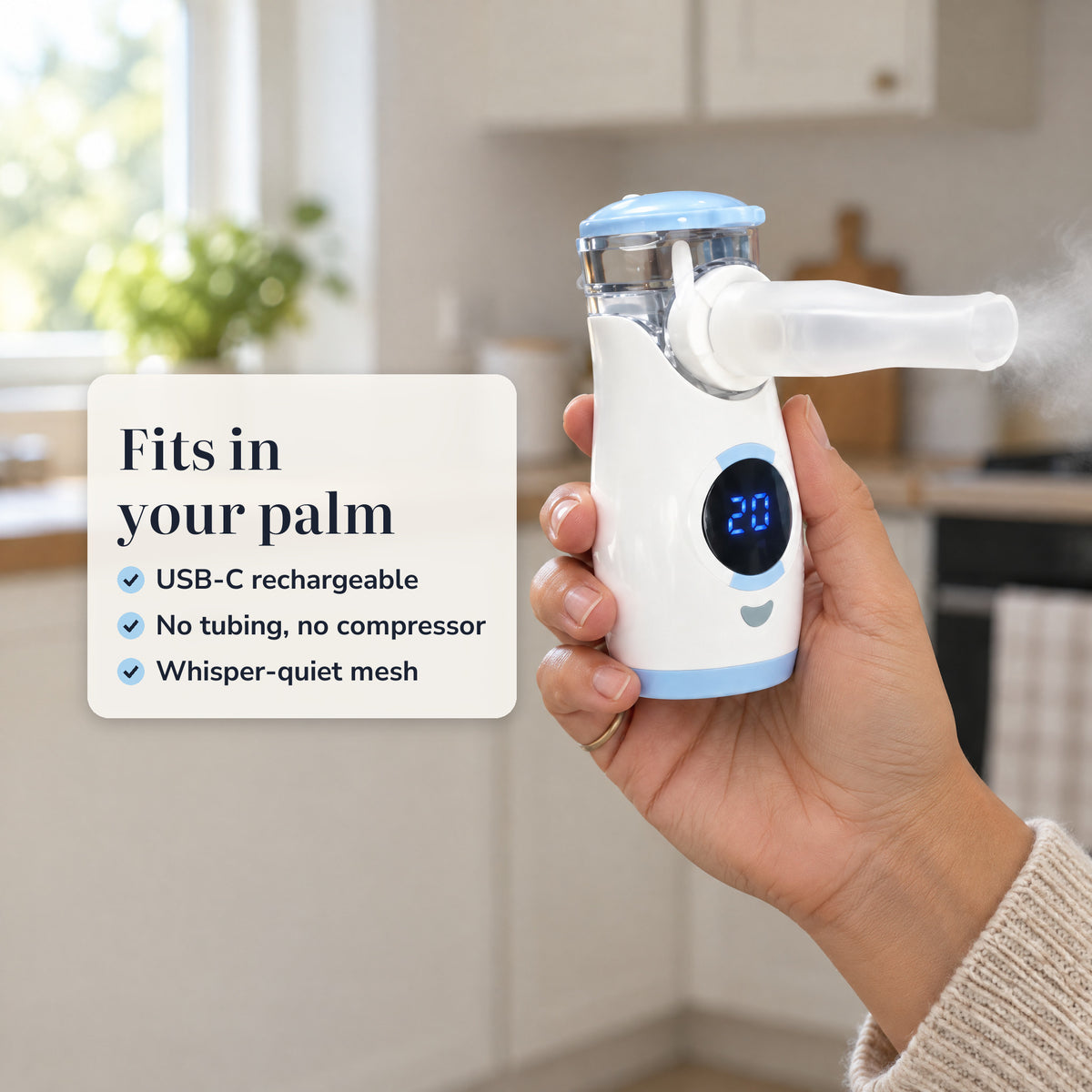 Handheld mesh nebulizer held in one palm